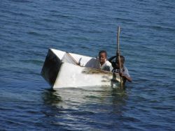 The morning commute, Roatan. by John Brethauer 